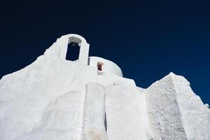 griego ortodoxo Iglesia de panagia paraportiani en pueblo de chora en mykonos isla foto