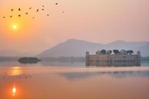Tranquil morning at Jal Mahal Water Palace at sunrise in Jaipur. Rajasthan, India photo