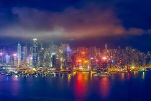 Aerial view of illuminated Hong Kong skyline. Hong Kong, China photo