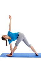 Yoga young beautiful woman doing yoga asana exercise isolated photo