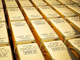 Stacks of gold bars close up photo