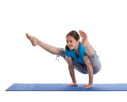 Yoga young beautiful woman doing yoga asana exercise isolated photo