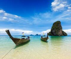 Long tail boats on beach, Thailand photo