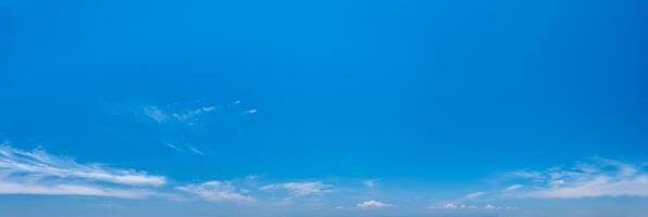 Summer blue sky with rare clouds photo