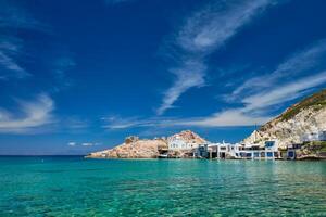 The beach of Firapotamos in Milos, Greece photo