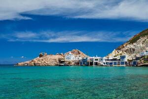 The beach of Firapotamos in Milos, Greece photo