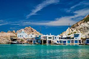 The beach of Firapotamos in Milos, Greece photo