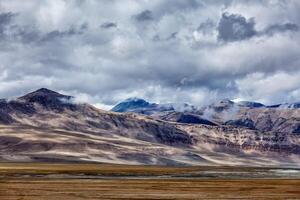 Tso Kar fluctuating salt lake in Himalayas photo