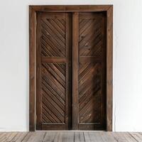 Dark brown wooden door with diagonal grooves on the surface with white wall in background. photo