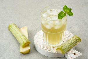 Fresh sugar cane juice or Es Tebu photo