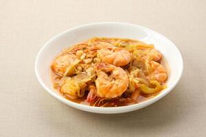 Udang Asam Manis, sweet and sour shrimp with tomato and chilli sauce. Indonesian food. photo