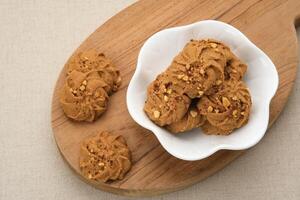 Chocolate cookies with peanut sprinkles photo