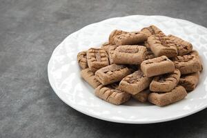 kue sagu o sagú muerde, sano galletas hecho desde sagú harina, tapioca harina, bajo grasa manteca, y chocolate foto