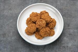 Chocolate cookies with peanut sprinkles photo