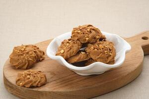 Chocolate cookies with peanut sprinkles photo