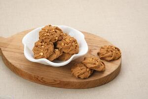 Chocolate cookies with peanut sprinkles photo