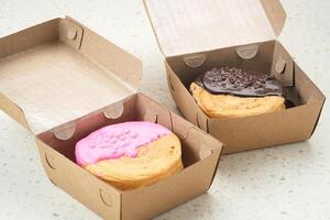 Cromboloni or Crombolini, croissant bomboloni pastry filling with chocolate paste photo