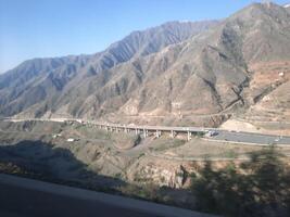 Al Bahah, Saudi Arabia, 12 April 2024 - Beautiful daytime view of King Fahd road in Sarawat mountains near Al Baha, Saudi Arabia. photo