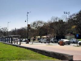 Abha, Saudi Arabia, 12 April 2024 - A beautiful view of trees and grass in a park near the famous The Art Street in Abha, Saudi Arabia. photo