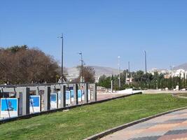 Abha, Saudi Arabia, 12 April 2024 - A beautiful view of trees and grass in a park near the famous The Art Street in Abha, Saudi Arabia. photo