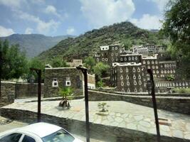 Asir, Saudi Arabia, 12 April 2024 - Beautiful daytime view of Rijal Almaa heritage village in Asir region in Saudi Arabia. photo