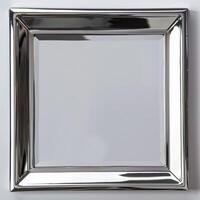 A square mirrored chrome frame with rounded bevel. photo