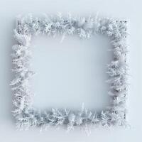 A square frame made from frost on white background, empty space in the center for text or photo. photo