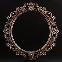 A vintage empty gold frame embedded with diamonds. photo