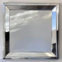 A square mirrored chrome frame with rounded bevel. photo