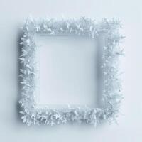 A square frame made from frost on white background, empty space in the center for text or photo. photo