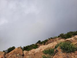 Breathtaking natural beauty of Abha in Saudi Arabia in the summer season. High mountains, greenery, low clouds and fog are the beauty of Abha. photo