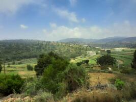 Breathtaking natural beauty of Abha in Saudi Arabia in the summer season. High mountains, greenery, low clouds and fog are the beauty of Abha. photo