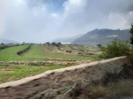 Breathtaking natural beauty of Abha in Saudi Arabia in the summer season. High mountains, greenery, low clouds and fog are the beauty of Abha. photo