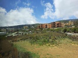 Breathtaking natural beauty of Abha in Saudi Arabia in the summer season. High mountains, greenery, low clouds and fog are the beauty of Abha. photo