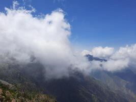 Breathtaking natural beauty of Abha in Saudi Arabia in the summer season. High mountains, greenery, low clouds and fog are the beauty of Abha. photo