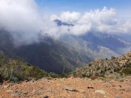 Breathtaking natural beauty of Abha in Saudi Arabia in the summer season. High mountains, greenery, low clouds and fog are the beauty of Abha. photo