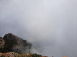 Breathtaking natural beauty of Abha in Saudi Arabia in the summer season. High mountains, greenery, low clouds and fog are the beauty of Abha. photo