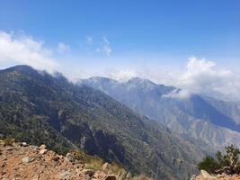 Breathtaking natural beauty of Abha in Saudi Arabia in the summer season. High mountains, greenery, low clouds and fog are the beauty of Abha. photo