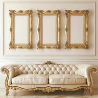 A vintage, antique frame with intricate gold detailing hangs on the wall above a plush velvet sofa. photo