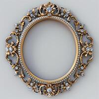 A vintage empty gold frame embedded with diamonds. photo