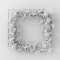 A square frame made from frost on white background, empty space in the center for text or photo. photo