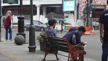 Bandung, West Java. May 26, 2023, the atmosphere of the Asia-Africa Bandung street while on vacation photo