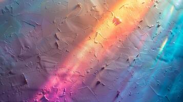 Macro detail of rainbow light rays on a white wall. photo