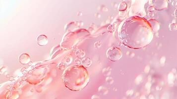 Flowing water bubbles in light pink gradient on minimalistic background. photo