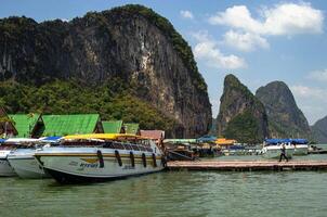 Ko Panyi - muslim fishing village. Koh Panyee settlement built on stilts of Phang Nga Bay, Thailand photo