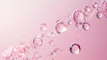 Flowing water bubbles in light pink gradient on minimalistic background. photo