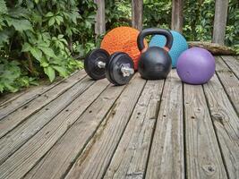 heavy slam balls, iron kettlebell and dumbbell photo