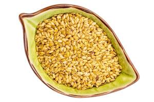 golen flax seeds in a bowl photo