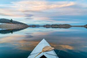 winter canoe paddling in Colorado photo