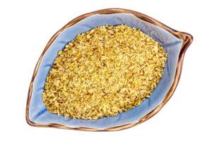 golden flax meal in a bowl photo